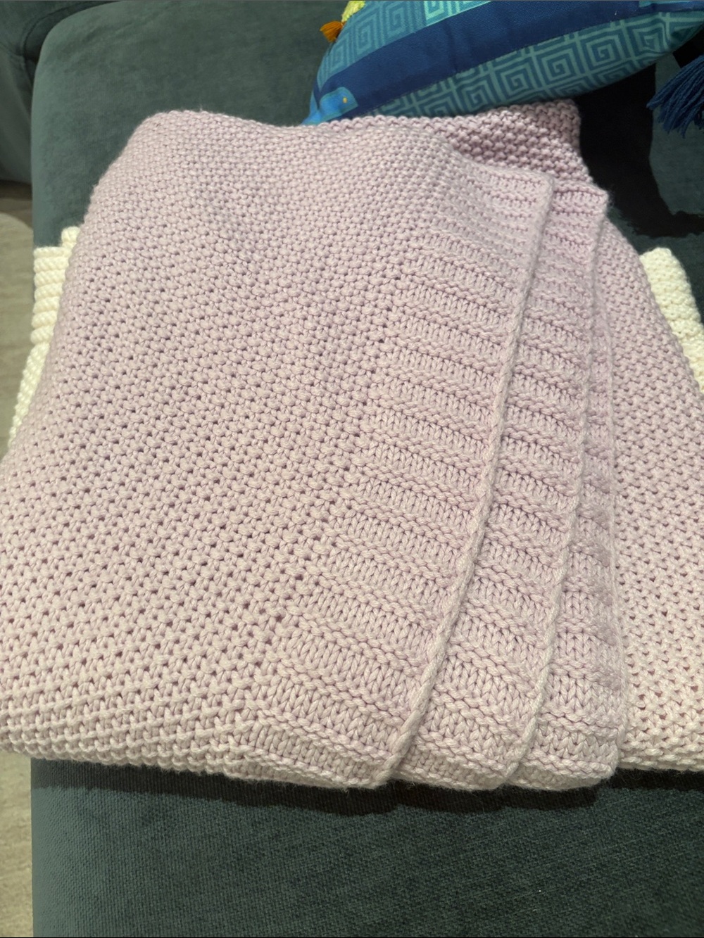 Soft Knit blanket. Light Pink and purple. Approximately 5 by 5 feet